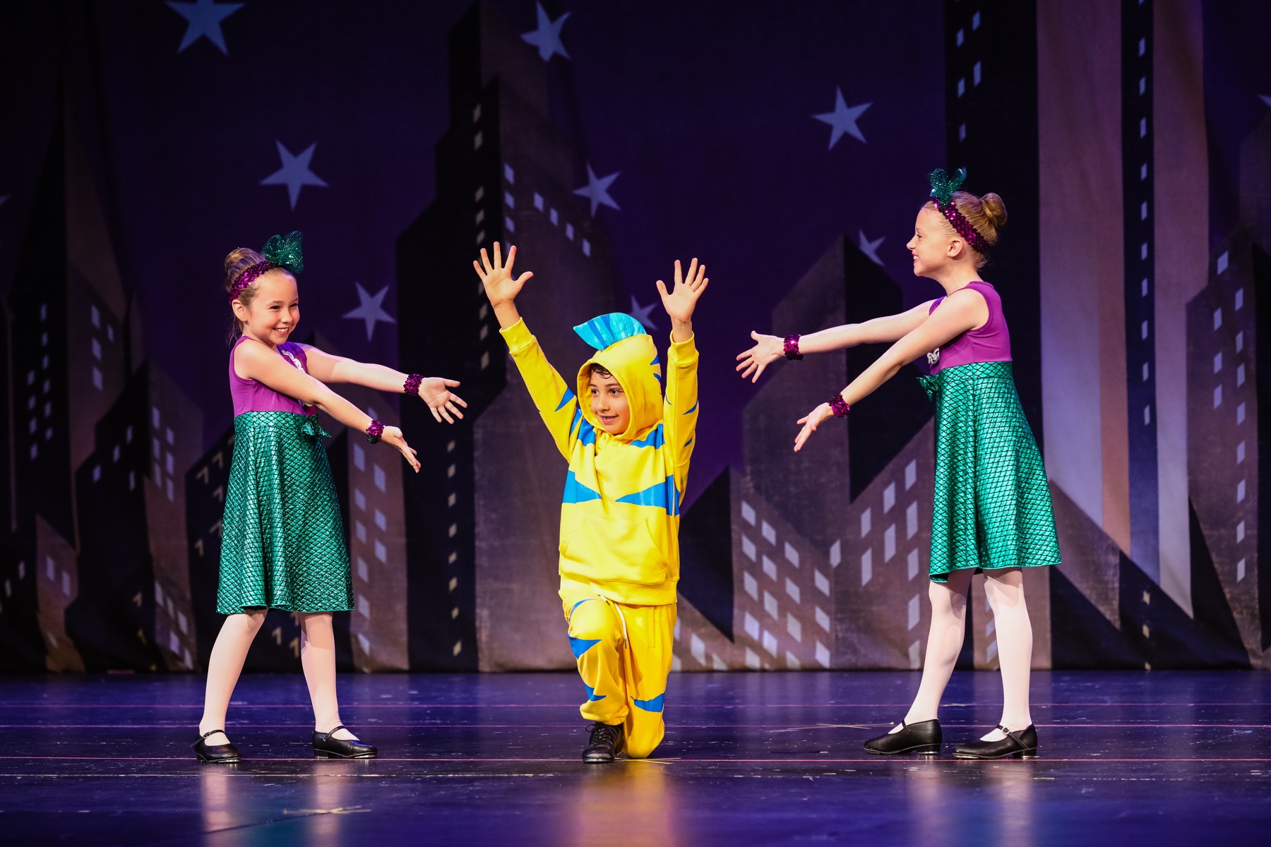 Tap dancers performing a Little Mermaid number